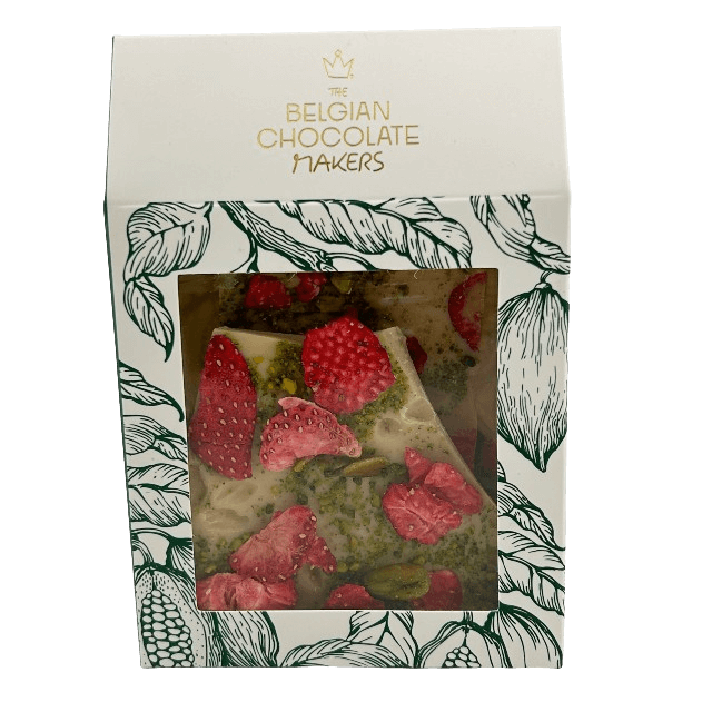 Riegel aus weißer Schokolade mit Erdbeeren und Pistazien