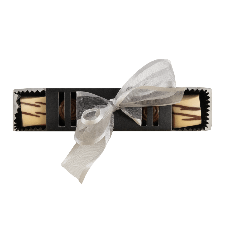 Stange mit weißen Pralinen (Ganache, Karamell) & Milchpralinen (Praliné)