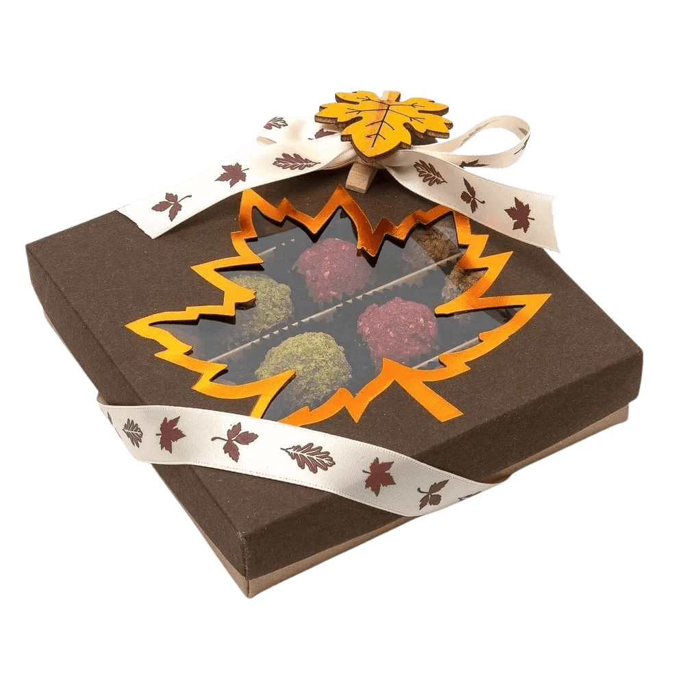 Herbstliche belgische Trüffelmischung in einer dunkelbraunen Geschenkbox